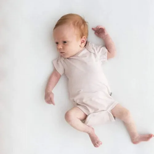 Kyte Baby Bodysuit in Blush - 0-3 Months